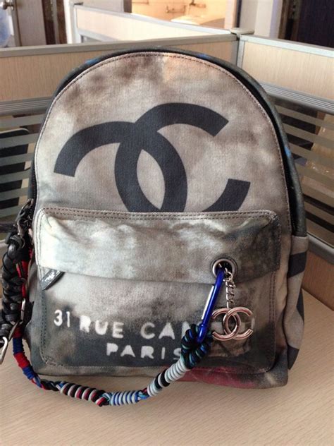 chanel canvas backpack black|pre owned Chanel backpack.